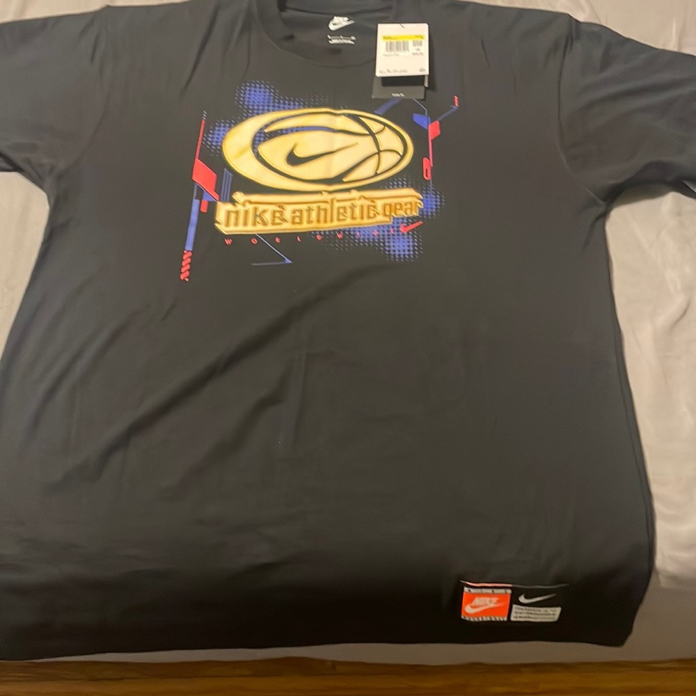 Authentic small Nike tee shirt. Brand new.